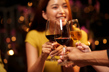 Throw a party Celebrate whiskey at a friendly party in a restaurant. Night.