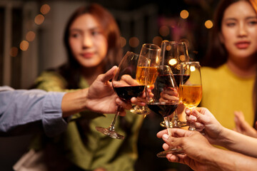 Throw a party Celebrate whiskey at a friendly party in a restaurant. Night.