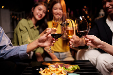 Throw a party Celebrate whiskey at a friendly party in a restaurant. Night.