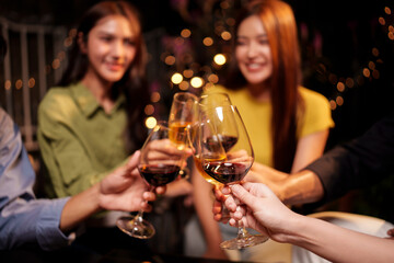 Throw a party Celebrate whiskey at a friendly party in a restaurant. Night.
