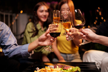 Throw a party Celebrate whiskey at a friendly party in a restaurant. Night.