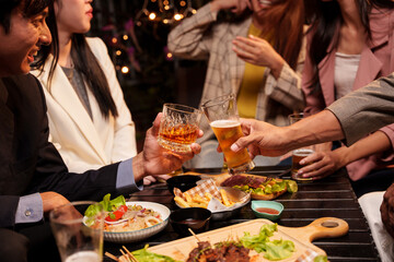 Throw a party Celebrate whiskey at a friendly party in a restaurant. Night.