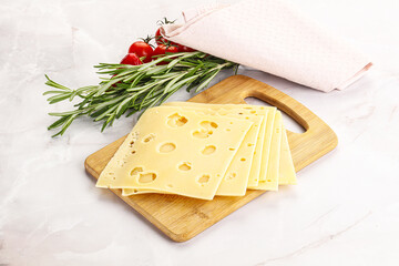 Sliced maasdam cheese with holes