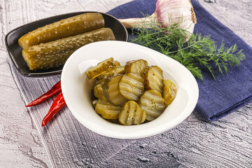 Sliced marinated cucumbers in the bowl