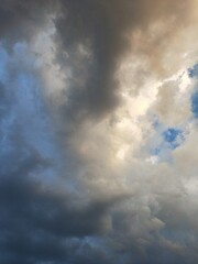 Obraz premium Dusk and dawn dramatic clouds float in the evening golden hour