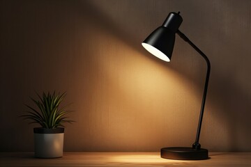 A stylish black desk lamp illuminating a workspace beside a potted plant on a wooden table in a cozy setting