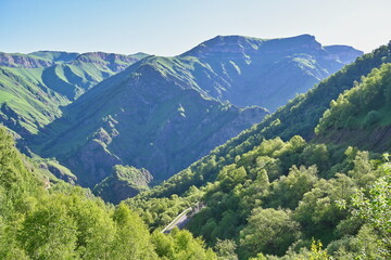 Forested slopes of the Dzhily-su gorge on a summer day