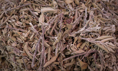 Dried sage leaves. in piles at the market.