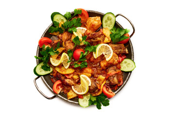 A plate of food with a variety of vegetables and meat