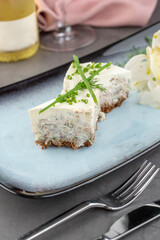 Creamy fish terrine with dill and radish garnish