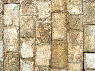 A brick wall with a brown color