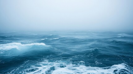 Fototapeta premium Ocean Waves Crashing Under a Misty Sky