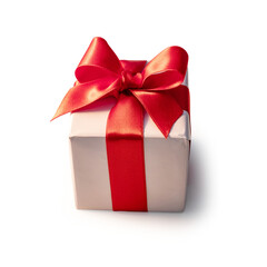 The elegant gift box features a soft beige exterior adorned with a vibrant red ribbon and bow, ideal for special events such as birthdays or holidays.