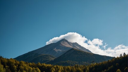 a mountain with a cloud
