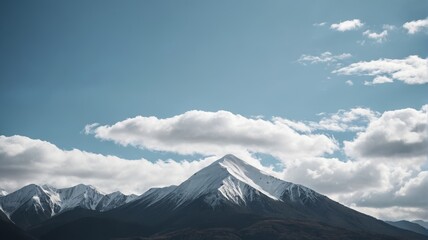 Fototapeta premium a mountain range with a few clouds