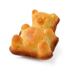 Sweet bear-shaped baked treat resting on a white surface ready for enjoyment as a delightful snack or dessert