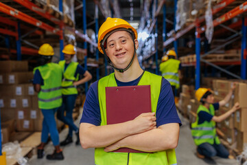 Portrait of a proud warehouse worker with Down syndrome