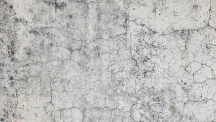 Old gray cement wall texture with black stains, Textured color on cement background. Old concrete wall with cracked flaking paint. The white painted wall surface has scratches and peeling paint.