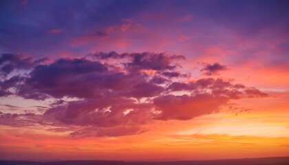 Obraz premium sunset cloudscape Panoramic with rich purple and pink tones blending into orange at horizon, tranquil evening sky view, natural dusk setting, soft wispy cloud formation, twilight backdrop