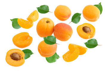 flying cut of apricot fruit with green leaf isolated on white background. clipping path