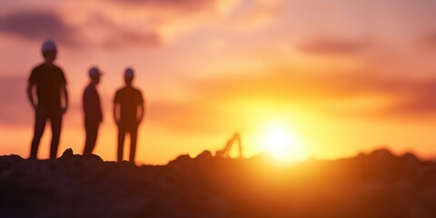 Fototapeta premium Three silhouetted workers stand against a vibrant sunset backdrop, symbolizing labor, dedication, and the beauty of the workday's end captured in serene tones.