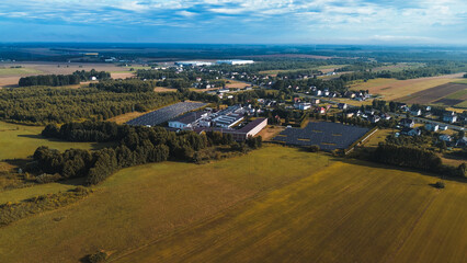 Solar panels on factory in sunlight