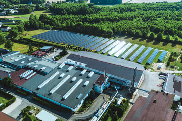 Sunlit solar panel field powering rural infrastructure