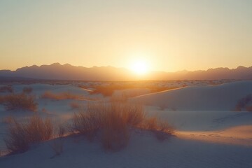 sunset over desert dunes with soft light