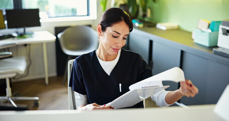 Clinic, receptionist and woman with documents for medical service, appointment and administration....