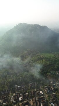 4k footage of rural atmosphere in the morning with views of mountains and rice fields and clear skies