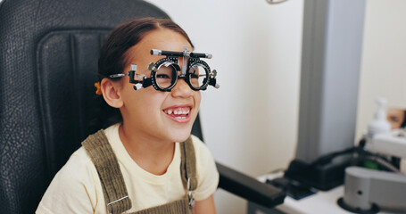 Trial frame, smile or girl in eye test at optometry clinic for eyewear, retina health or sight...