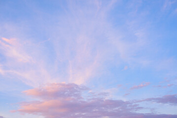 Beautiful pink clouds on blue sky in summer travel