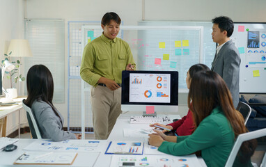 Team work process Business team use calculator to calculate figures, business statistics, profit, cost analysis, growth rate graph document. Data charts on the desk.