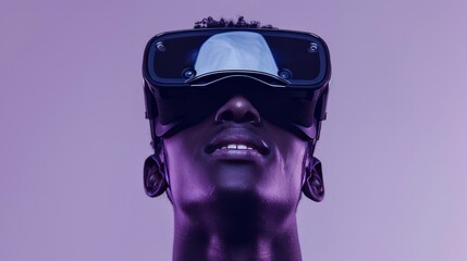 A young man wearing opaque virtual reality goggles, with a look of excitement