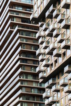 A captivating juxtaposition of overlapping modern buildings, utilizing interesting lines and perspectives, illustrating the complexity of urban architecture and living spaces in Rotterdam