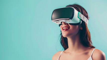 Fototapeta premium A young woman wearing opaque virtual reality goggles, clapping her hands