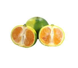 One whole green tangerine and two halves on transparent background