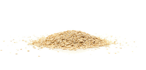 Dry raw oat flakes isolated, rolled flat grains, instant porridge, thin cereals, flattened grains group