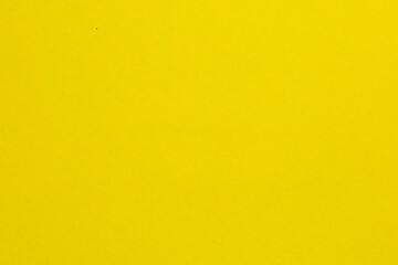 Fototapeta premium A yellow background with a white line, textured origami paper backdrop