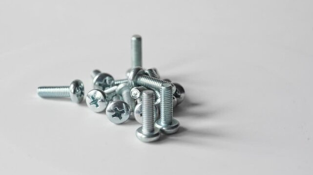 video of screws hardware on white background