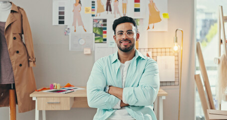 Arms crossed, creative and portrait of fashion designer man in textile workshop for production....