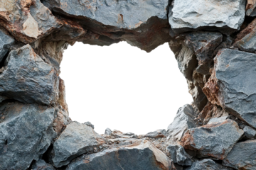 A rough hole in a stone wall with sharp, jagged edges, creating a natural frame against a transparent background
