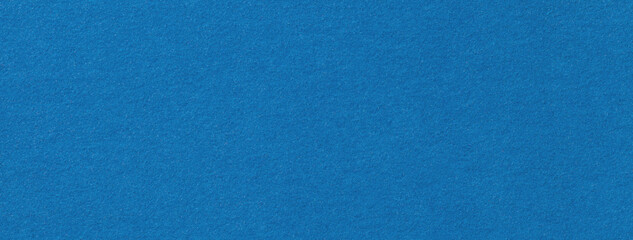 Texture navy blue color background from felt textile material, macro. Structure of vintage denim fabric