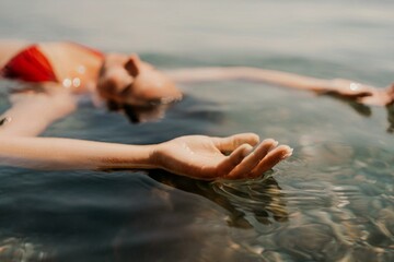 Happy woman sea relaxing floating in transparent sea water on summer holiday. Travel leisure recreation lifestyle, female in nature.