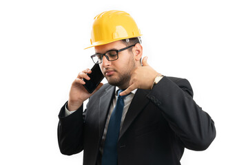 Serious engineer man making call gesture while speaking on phone