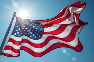Majestic American Flag Waving Against Bright Blue Sky with Sunburst