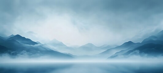 A blue winter background with mist and mountains in the distance
