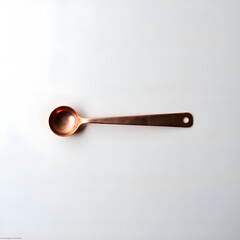 Beautiful copper measuring spoon on a soft background   perfect for kitchen decor and culinary use, photography of still life concept.