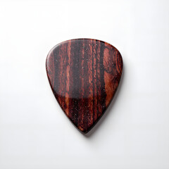 Elegant wooden guitar pick on white background for music enthusiasts and collectors, photography of still life concept.