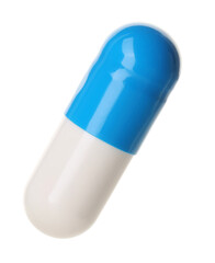 One antibiotic pill isolated on white. Medicinal treatment